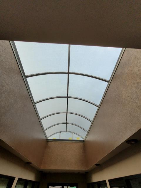 Commercial grade skylights. Custom made and installed skylights. Specialty type skylight install on commercial grade membrane flat roof.