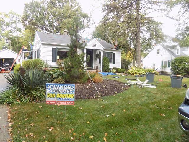 Roof replacement in progress, Geneva IL Before